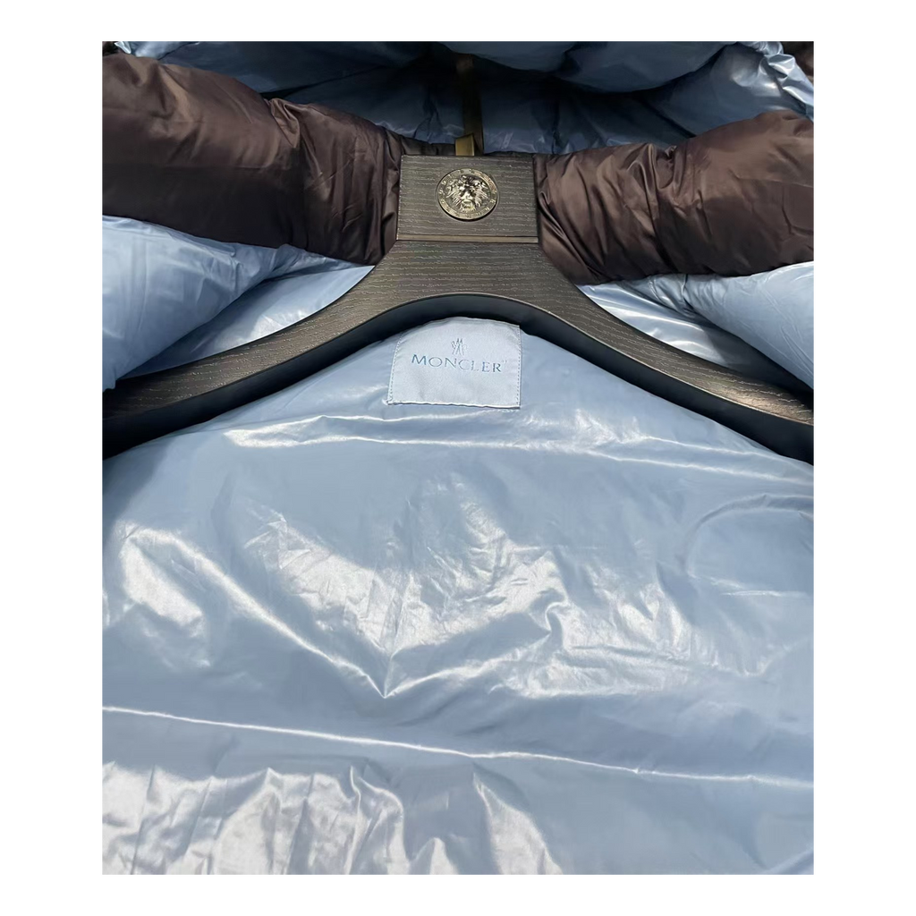 Moncler Oversized Chest-Badge Hooded Puffer – Bold Fit, Premium Down